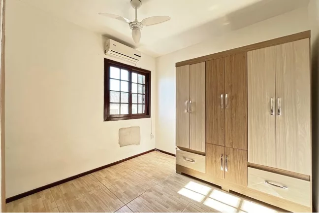 Imagem Casa em Condomínio para venda no bairro Vila Nova em Porto Alegre
