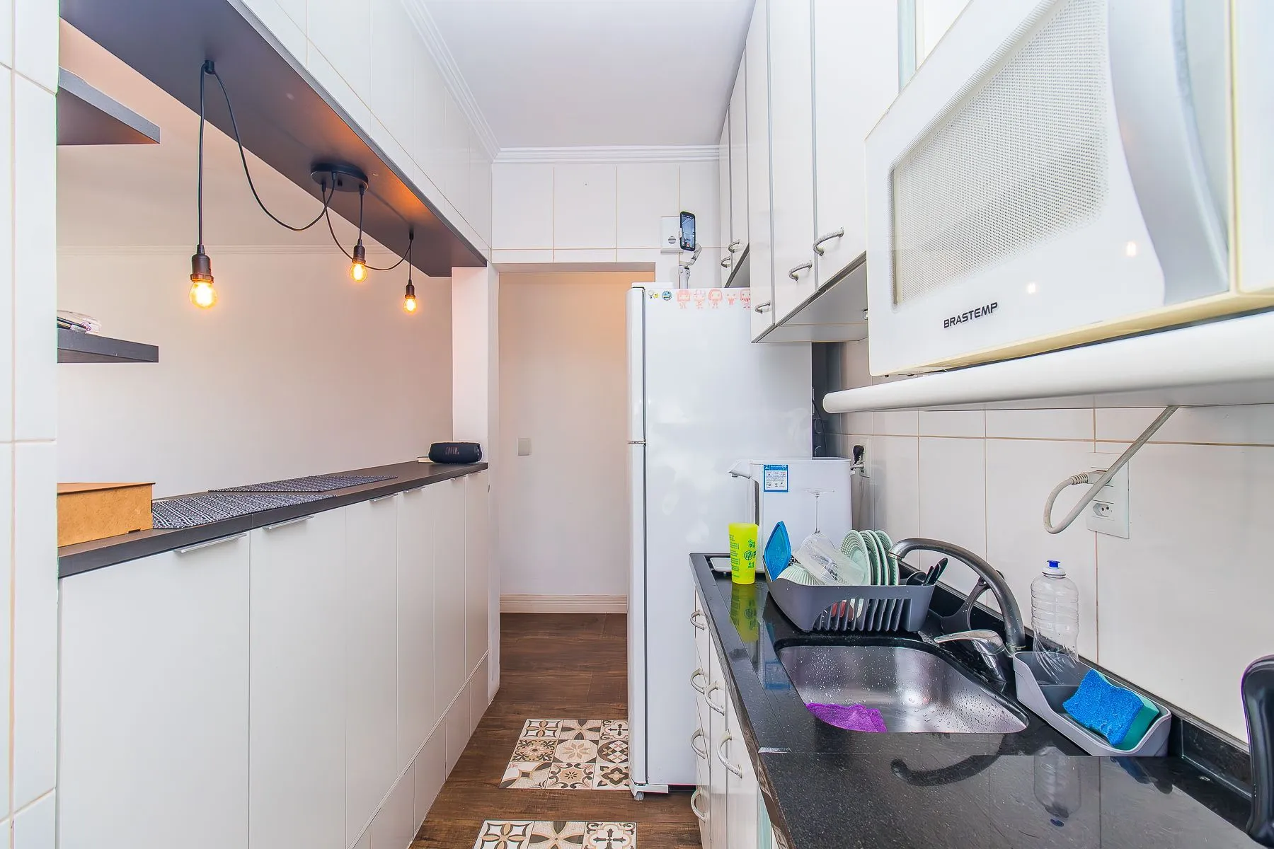 Imagem Amplo apartamento duplex com 2 dormitórios e 1 vaga de garagem.