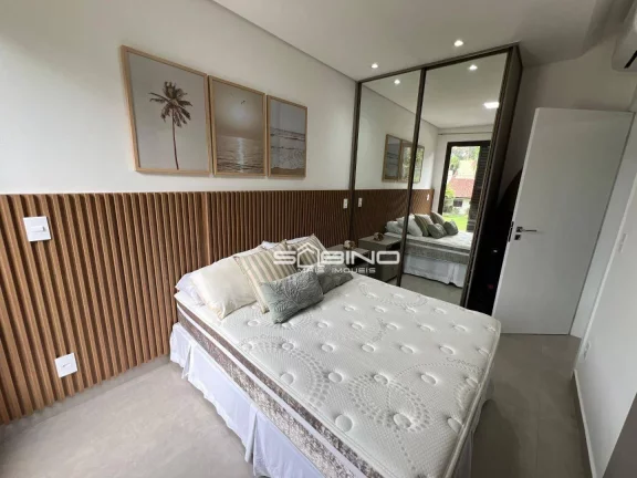Imagem Imóvel à Venda na Riviera de São Lourenço, Com 2 dormitórios 1 suíte, com 62m² de área útil, 2 vagas de garagem