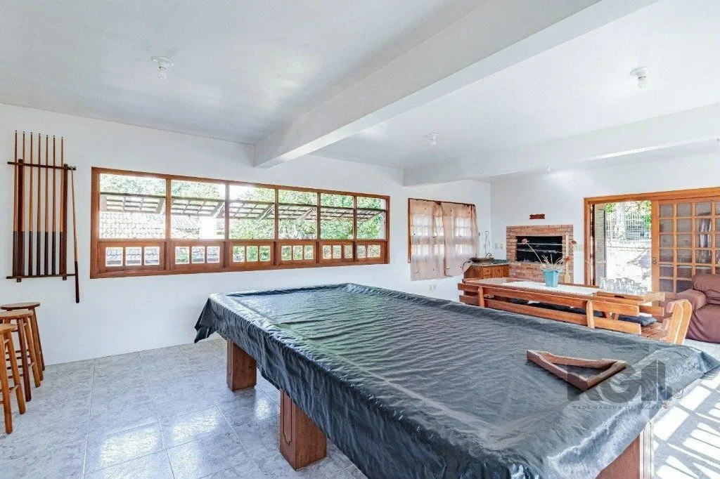 Imagem Casa com 267m², 3 dormitórios, 1 vaga no bairro Tristeza