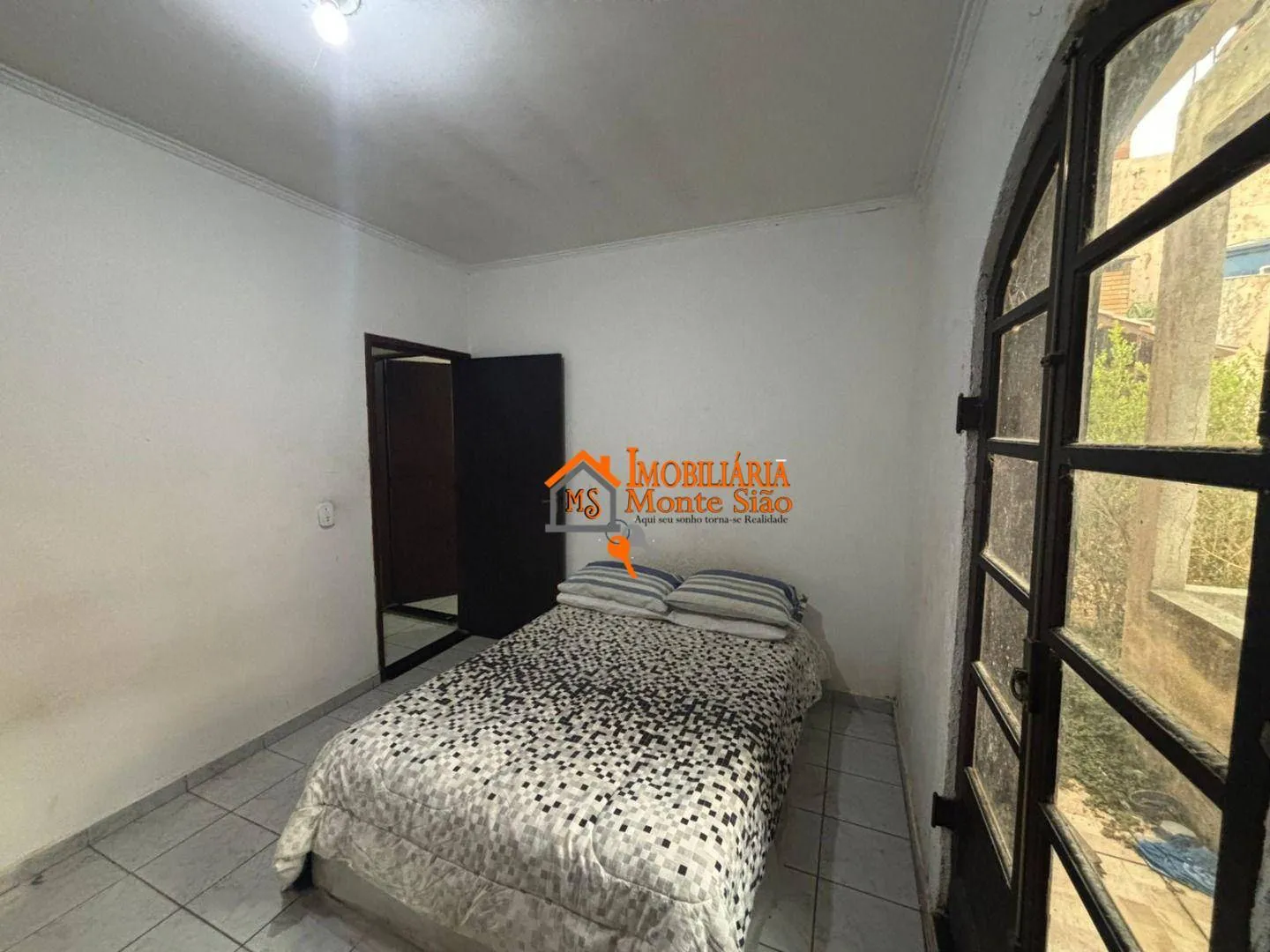 Imagem Casa com 4 dormitórios à venda por R$ 775.000 - Vila Cocaia - Guarulhos/SP