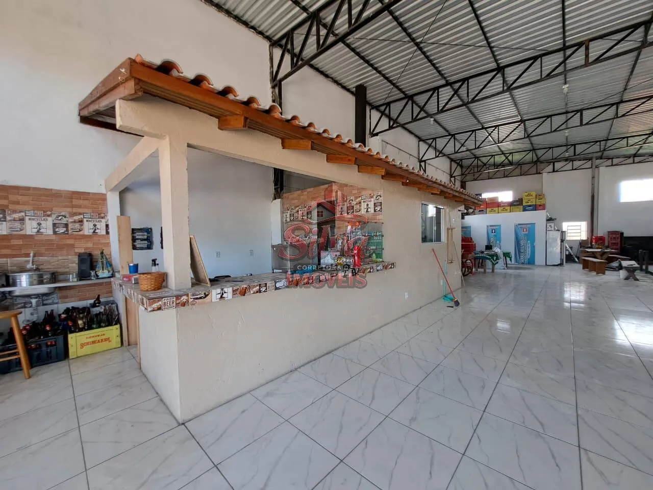 Imagem PC104 | Prédio comercial na avenida em Presidente