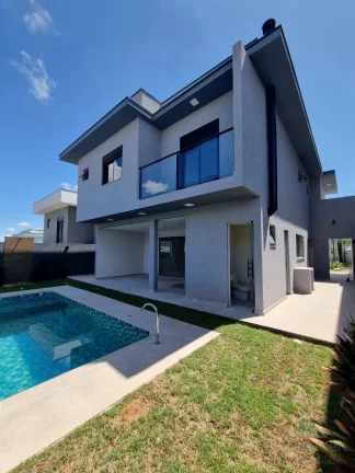 Imagem Casa 3 suítes e 4 vagas garagem, piscina , Condomínio Terras de Atibaia 1