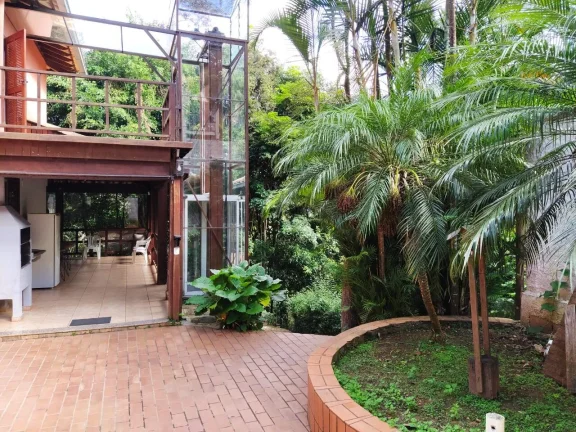 Imagem Casa de Condomínio com 4 Quartos e 5 banheiros à Venda, 1108 m²