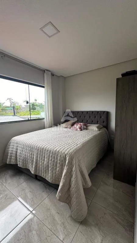 Imagem Oportunidade Única - Casa à Venda com Piscina I 2 Dormitórios I 1 Suíte I 2 Vagas de Garagem - em Areias do meio Governados Celso Ramos - SC
