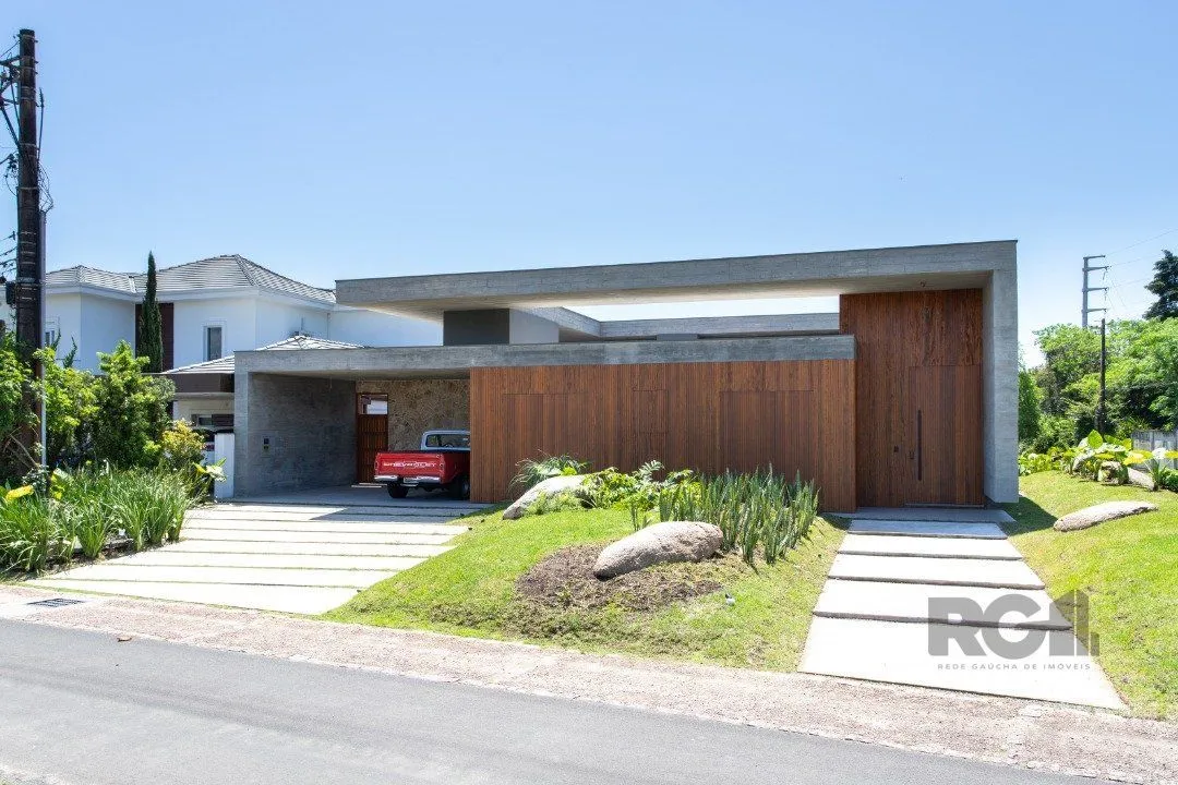 Imagem A Casa Le Mans, uma residência térrea de esquina com 389,48m2 de área coberta