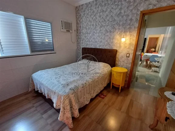 Imagem Espaçosa Casa Geminada no Mirim Praia Grande – 2 Quartos e Piscina