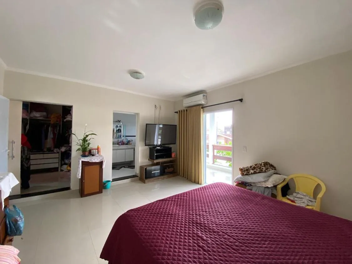 Imagem CASA DE ALTO PADRÃO COM 04 DORMITÓRIOS, PISCINA AQUECIDA E ACEITA FINANCIAMENTO BANCÁRIO LADO PRAIA EM ITANHAÉM