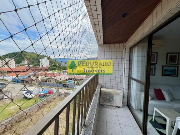 Imagem Apartamento de 2 quartos na Prainha, Caraguatatuba-SP 1 suíte, 2 salas, 2 banheiros, 1 vaga de garagem e vista para o mar