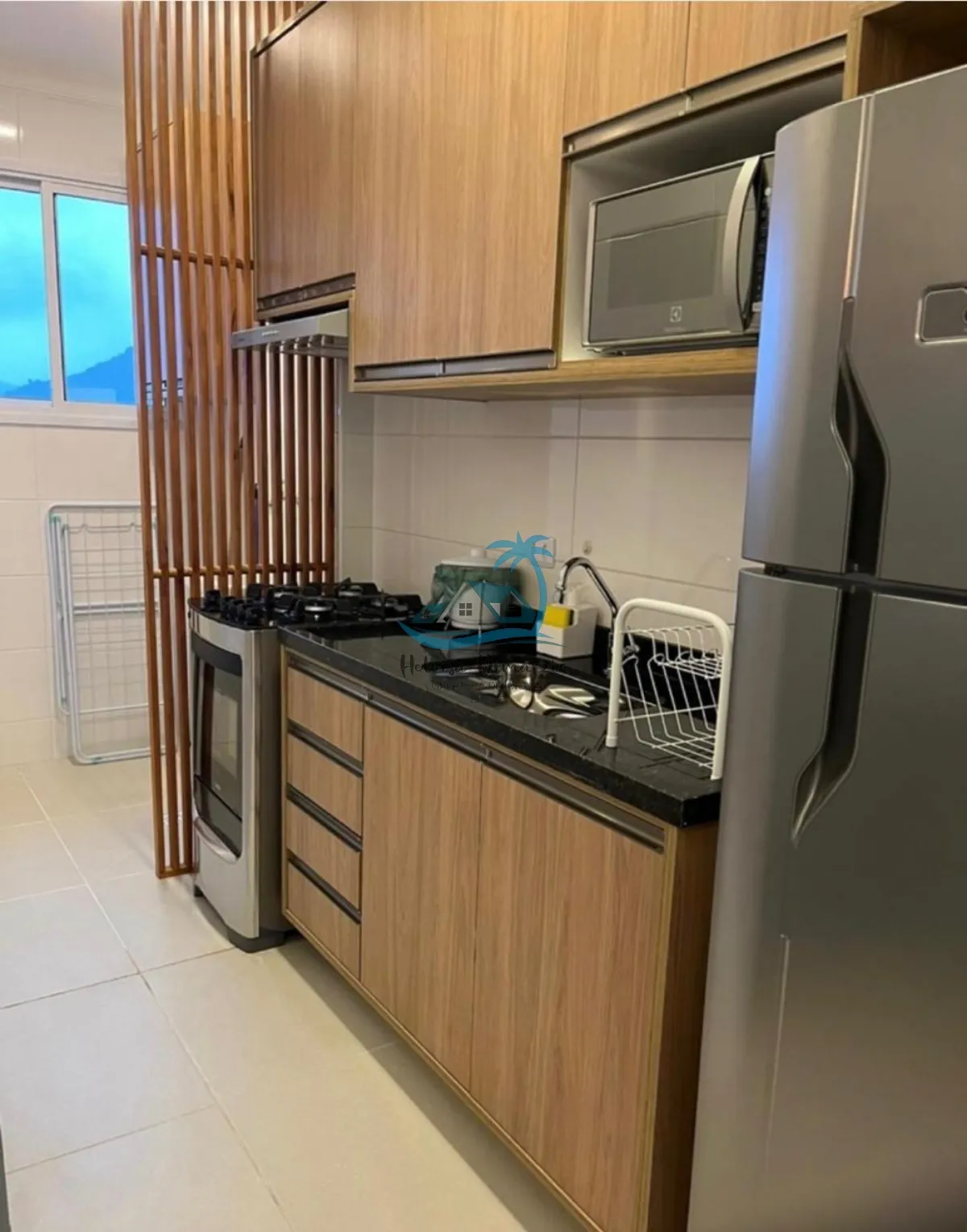 Imagem Apartamento mobiliado, com 2 dormitórios a venda em Ubatuba a 150 metros da Praia do Perequê Açu.