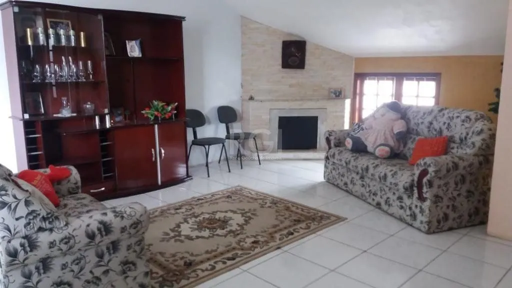 Imagem Casa com 3 dormitórios à venda, 230,11 m² por R$ 900.000,00 - Igara III - Canoas/RS