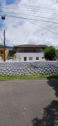 Imagem Sobrado com 4 dormitórios à venda, 180 m² por R$ 480.000,00 - Massaguaçu - Caraguatatuba/SP