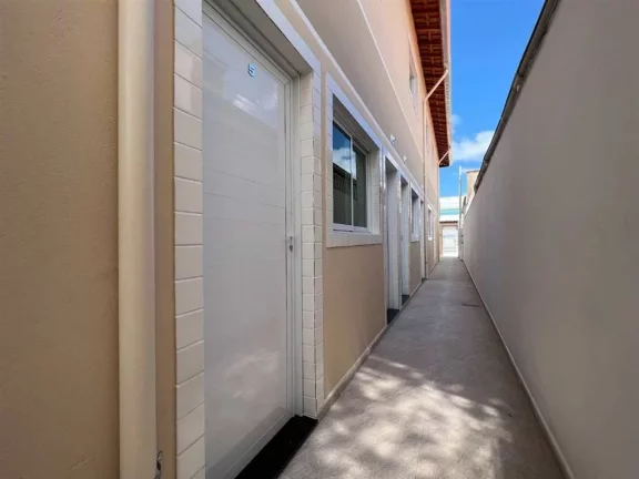 Imagem Casa com 2 dormitórios à venda, 51 m² por R$ 245.000 - Caiçara - Praia Grande/SP
