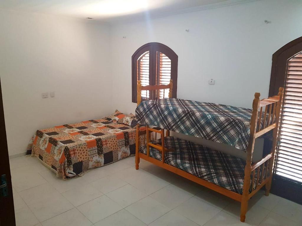 Imagem Casa com 4 Quartos para Temporada, 300 m²em Jardim Virgínia - Guarujá