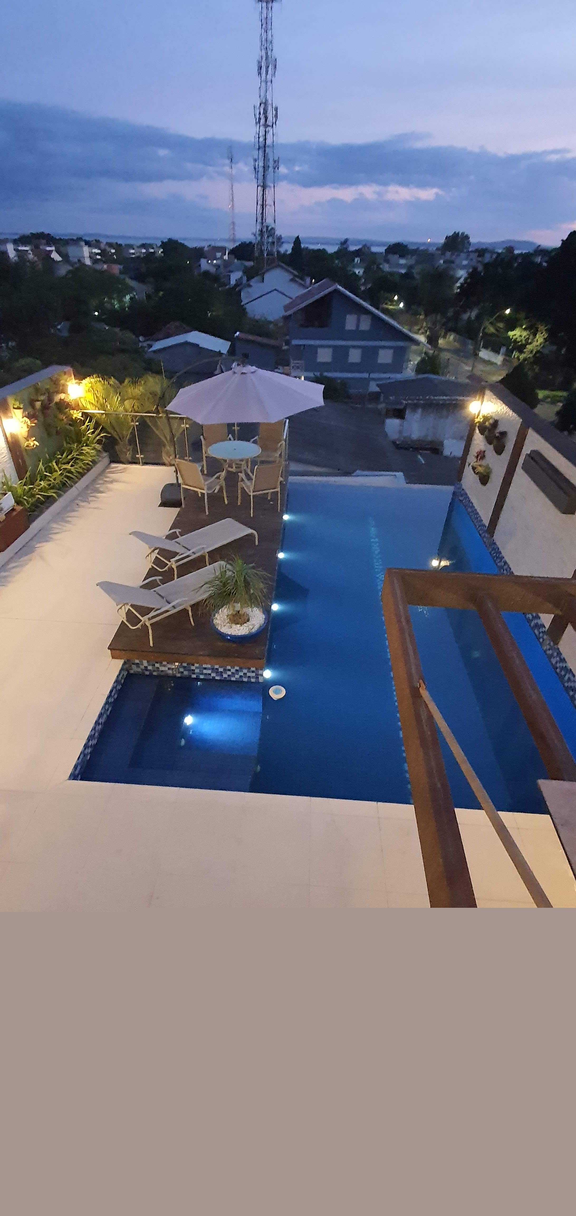 Imagem Casa com 4 Quartos à Venda, 600 m² em Pedra Redonda - Porto Alegre