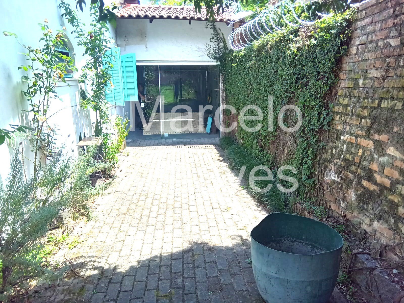 Imagem Sobrado com 3 Quartos à Venda, 100 m² em Jardim Botânico - Porto Alegre
