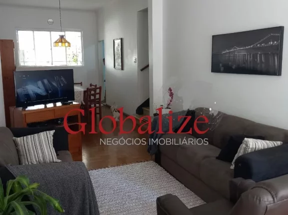 Imagem Sobrado à venda com 3 dormitórios e 2 vagas no bairro do Gonzaga em Santos por R$ 1.100.000,00