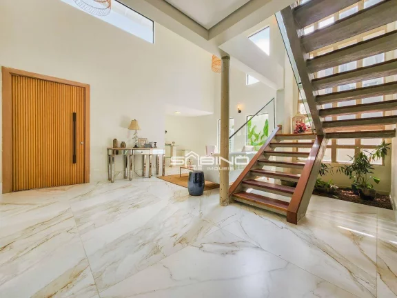 Imagem Belíssima casa à Venda com 3 Dormitórios 3 Suítes 350 m² de área útil - Riviera de São Lourenço - Bertioga SP