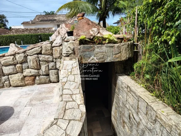 Imagem Casa no condomínio Granville 4 suítes, 2 salas, 806,4 m2 de área, 6 vagas de garagem no Guarujá-SP