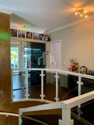Imagem Casa alto padrão 318m² | 4 suítes | Piscina aquecida | 7 vagas | Swiss Park
