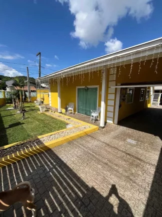 Imagem Casa com 3 dormitórios sendo 1 suíte e 5 vagas de garagem no bairro Parque Guarani em Joinville SC