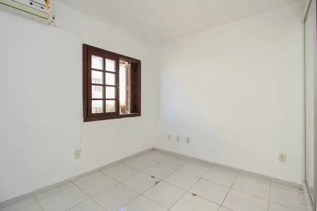 Imagem VNMC 100 Casa 610191037-89 - Casa à venda no bairro Vila Nova - Porto Alegre/RS