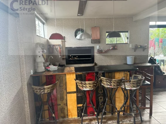 Imagem Imperdível Casa à venda em Criciúma-SC, Bairro Mina Brasil: 4 quartos, 1 suíte, 3 salas, 4 banheiros, 3 vagas, 220m2!