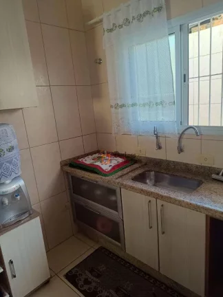 Imagem Sobrado com 2 dormitórios à venda, 79 m² por R$ 318.000 - Oceanópolis - Mongaguá/SP