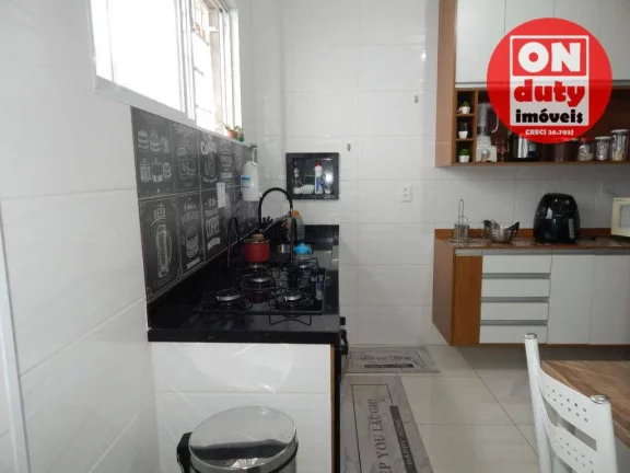 Imagem Casa com 2 dormitórios à venda, 73 m² por R$ 320.000,00 - Areia Branca - Santos/SP