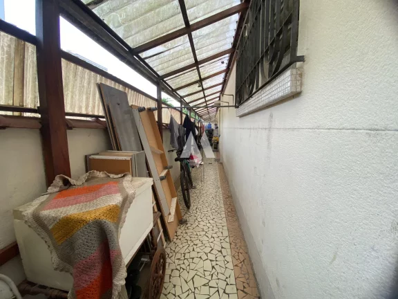 Imagem Sobrado com 4 dormitórios à venda em Santos/SP