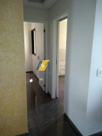 Imagem Com 2 dormitórios, sendo 1 suite, sala 2 ambientes.