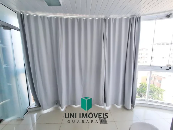 Imagem Apartamento de 130M² com 4 suítes, 2 vagas de garagem, prédio com área de lazer, Praia do morro, Guarapari-ES.