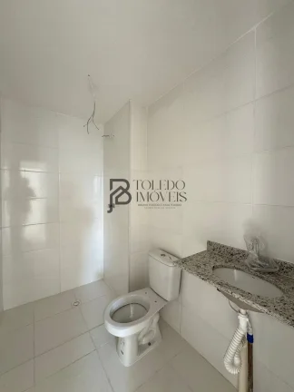 Imagem Apartamento de 2 dormitórios sendo 1 suíte, prédio frente mar no bairro Vila Mirim - Praia Grande