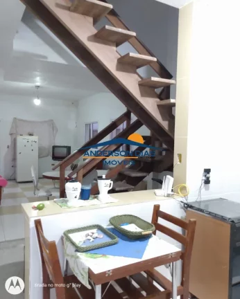 Sobrado em condomínio fechado com 2 dormitórios à venda, 75M² por R$ 350.000 - Massaguaçu - Caraguatatuba/SP