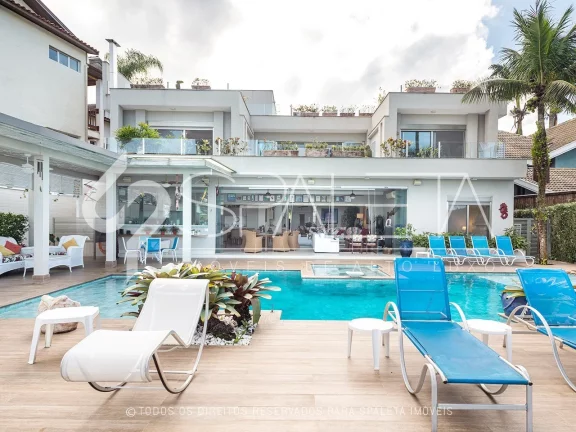 Imagem Mansão pé na areia totalmente mobiliada à venda no condomínio Costa Verde em Caraguatatuba