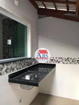 Imagem Sobrado com 2 dormitórios à venda, 71 m² por R$ 400.000,00 - Caiçara - Praia Grande/SP