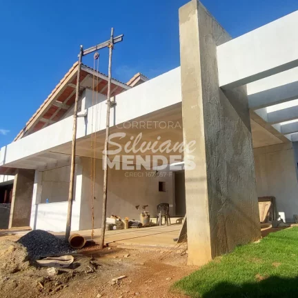 Imagem Imponente residência 402 m² com 5 suítes e complexo de lazer privativo