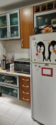 Imagem Apartamento com 47 M², 2 dormitórios, 1 banheiro, sala, cozinha, área de serviços e 1 vaga de ga...