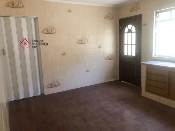 Imagem Sobrado à Venda em Santo Andr?(C) com 2 dormitórios , sala, cozinha, banheiro e lavanderia,com garagem coberta para dois carros. Fundos com quintal gran
