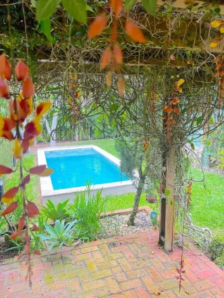 Imagem Casa com 3 dormitórios sendo1 suíte piscina e 2 vagas - Praia de Taquaras, Balneário Camboriú/SC