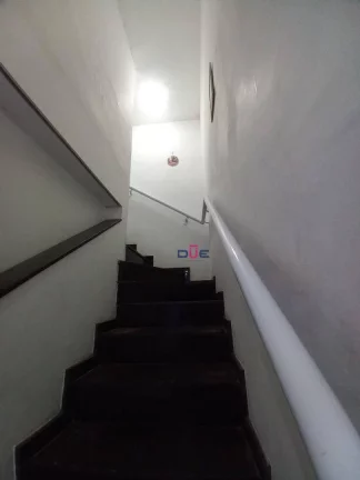 Imagem Village triplex com 2 suítes e 2 vagas à venda, 105 m² por R$ 484.000 - Macuco - Santos/SP