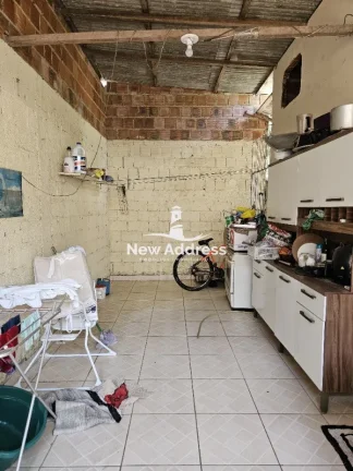 Imagem Casa 2 quartos à venda em Enseada de Jacaraípe, murada e gradeada, ideal para quem busca praticidade e quintal.