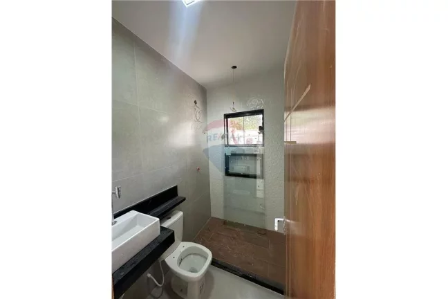 Imagem Uma casa belíssima em uma localização espetacular PRÓXIMO A PRAIA