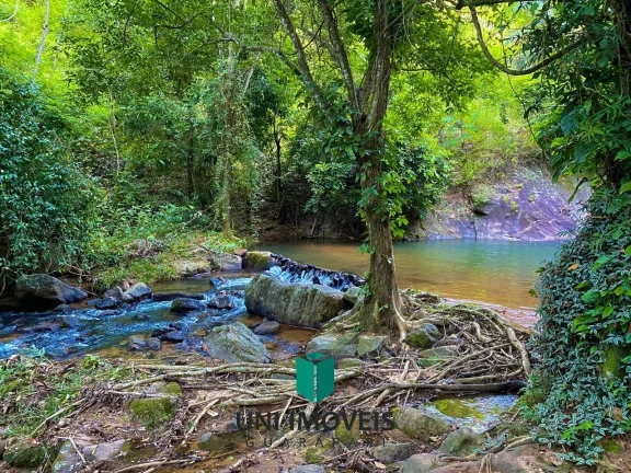 Imagem Chácara com 10 suítes e Cachoeira a venda, 9.104M² na zona rural de Guarapari.