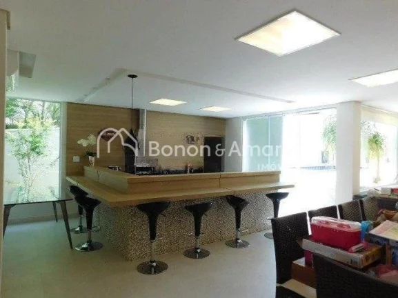 Imagem Casa em condomínio com 410 m² e 4 quartos