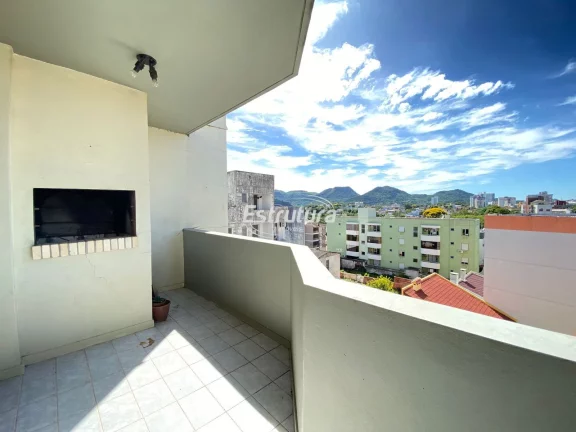 Apartamento 2 dormitórios com sacada, churrasqueira e box de garagem. Ótima loca