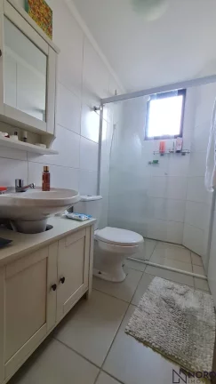 Imagem Apartamento Semi Mobiliado com 2 Dormitórios, Suíte, Churrasqueira e Garagem