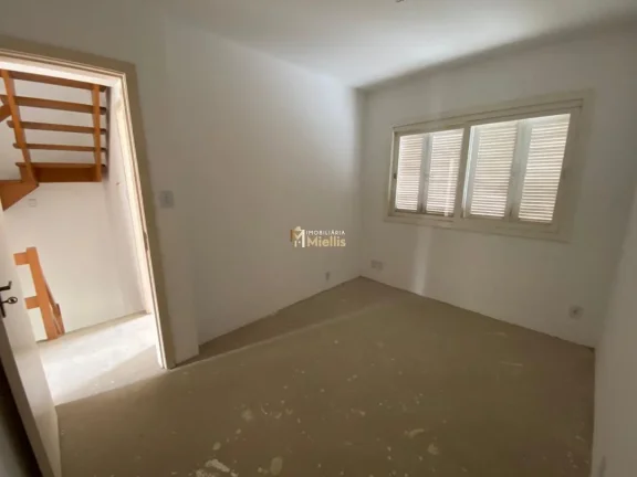Imagem Casa em Condomínio com 3 Dormitorio(s) localizado(a) no bairro GUARUJA em Porto Alegre / Rio Grande do Sul Ref.:57580302