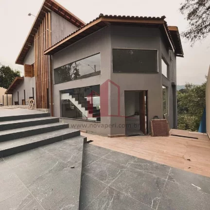 Imagem Imperdível oferta de casa em condomínio com 4 quartos no Jardim Lago da Cantareira, Mairiporã-SP: 4 suítes, 2 salas, 3 vagas, 330m²!