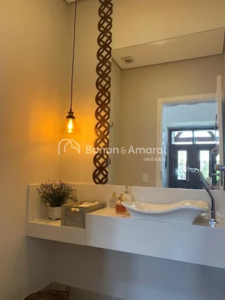 Imagem Casa térrea com sala de estar, sala de tv, lavabo, sala de jantar integrada à cozinha planejada e ...